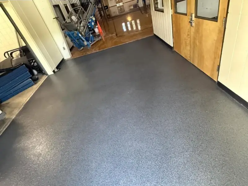 Hallway with a finished dark grey floor coating