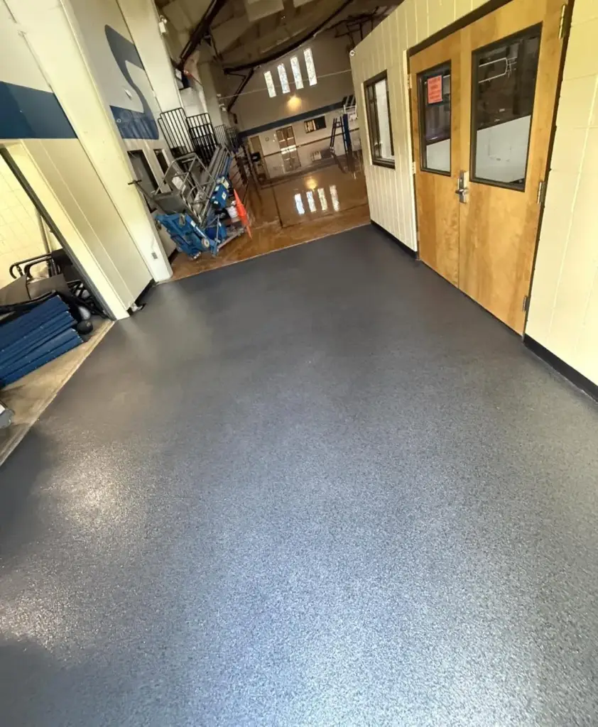 Hallway with a finished dark grey floor coating