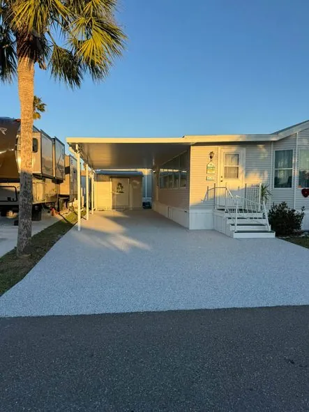 After: a cracked carport slab repaired and resurfaced.