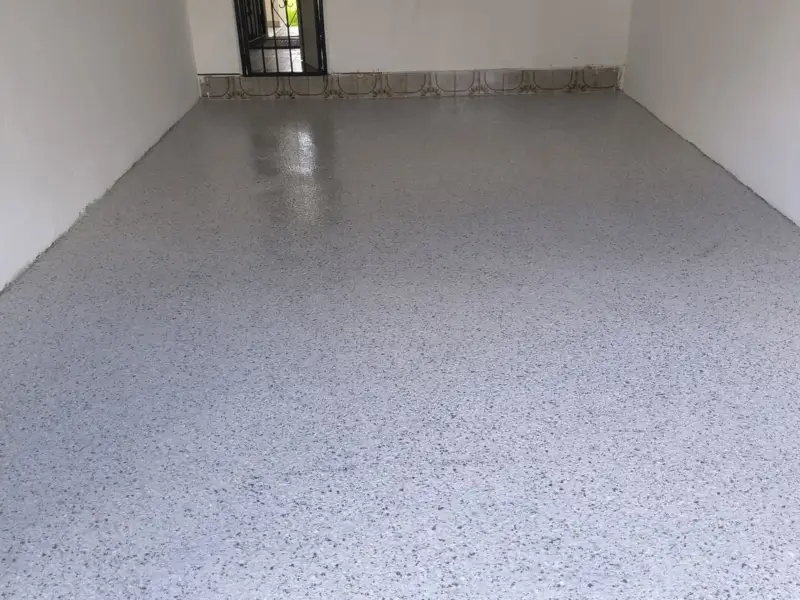 Narrow garage with a light grey flake floor coating