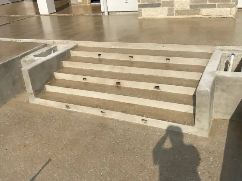 After: bare steps and patio stained and sealed.