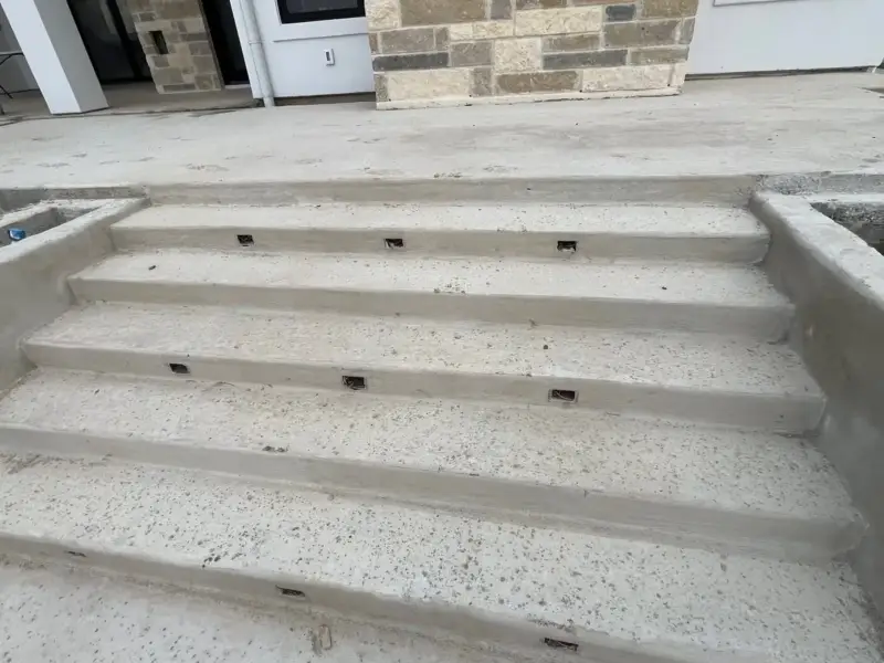 Before: bare steps and patio stained and sealed.