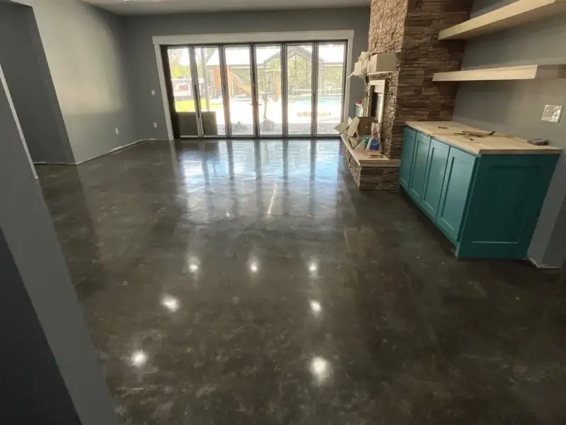After: a dusty interior slab stained and sealed to a gloss.
