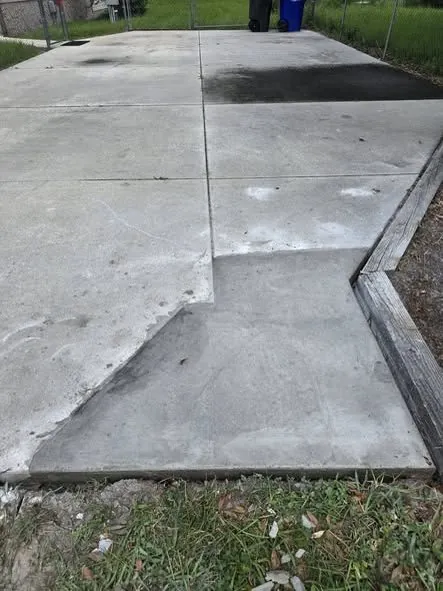 After: a cracked slab corner cut out and re-poured.