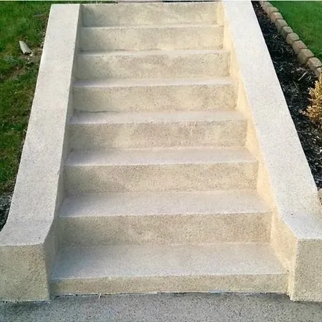 After: cracked, broken steps rebuilt and resurfaced.