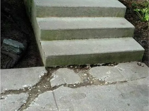 Before: worn steps and a broken walkway resurfaced together.