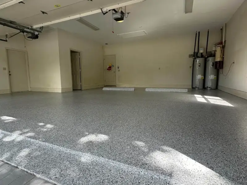 Two-car garage with a grey flake floor coating